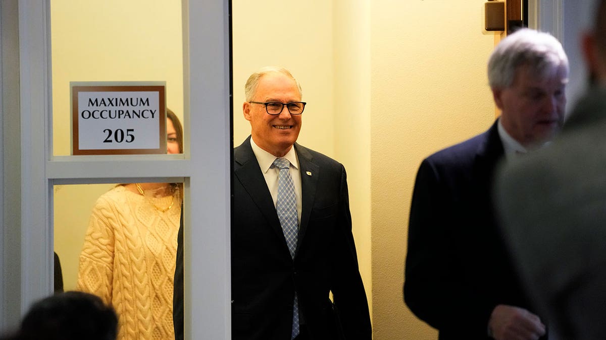 Jay Inslee arrives at session