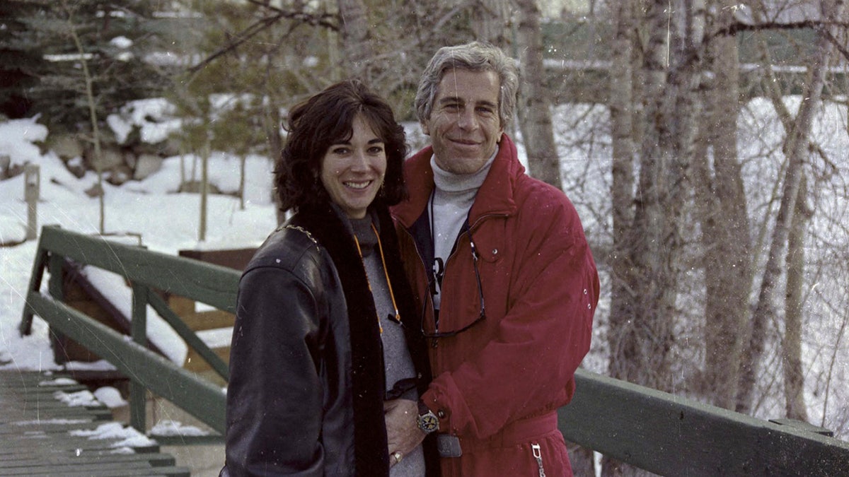Ghislaine Maxwell and Jeffrey Epstein grin successful this undated photograph