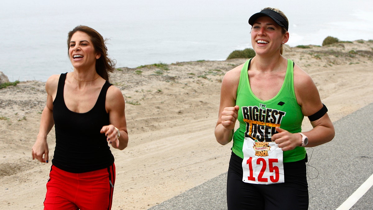 Jillian Michales jogging with a Biggest Loser contestant