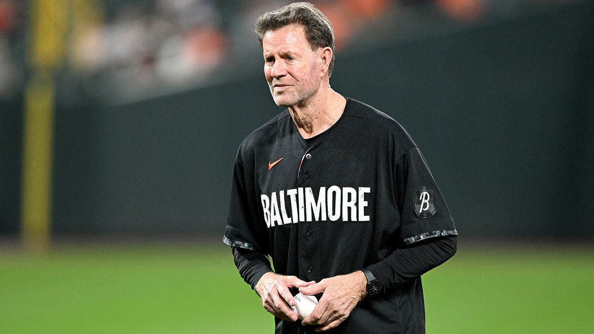 Jim Palmer walks on field