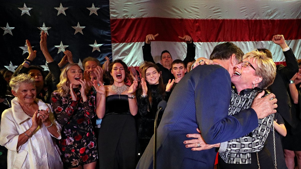 Joe Manchin hugs wife Gayle