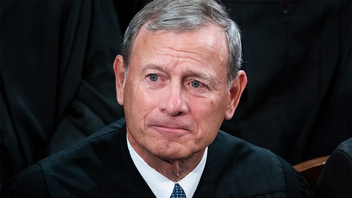 Chief Justice John Roberts sits during the State of the Union address.