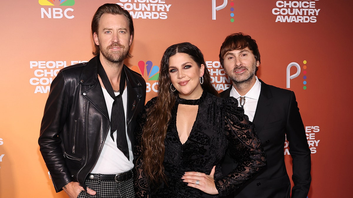 Charles Kelley, Hillary Scott, and Dave Haywood posing together