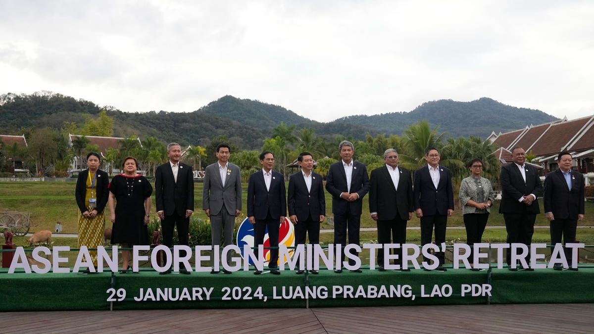 Representatives pose at the Association of Southeast Asian Nations