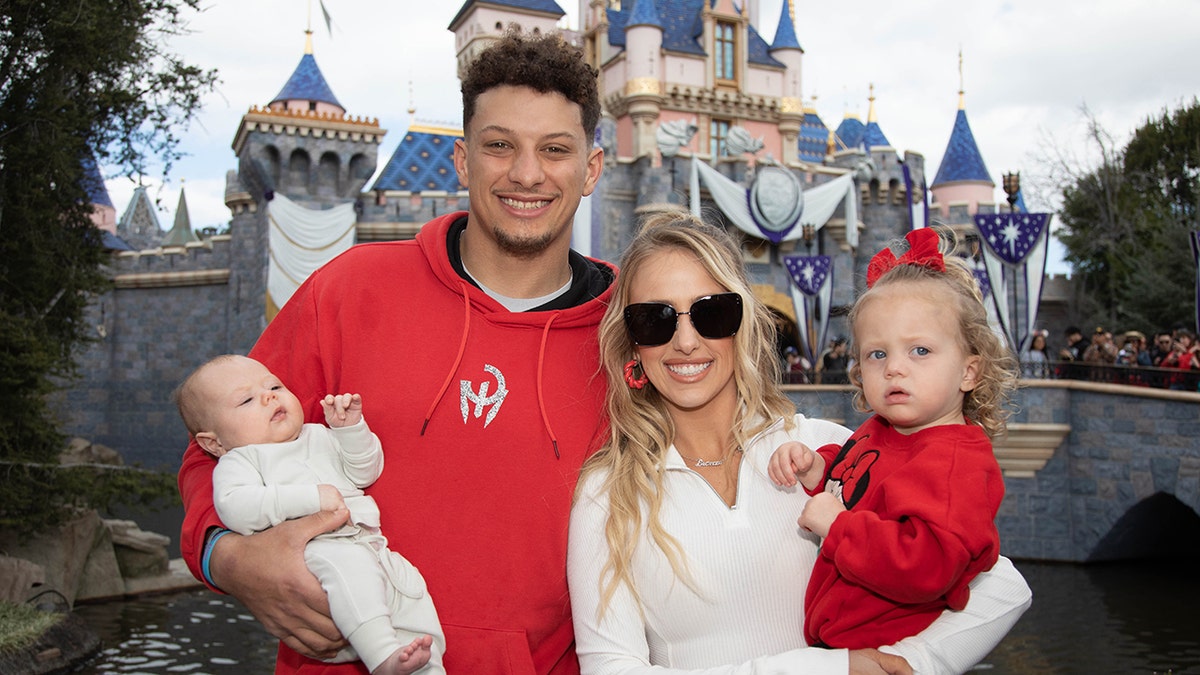 Patrick Mahomes and wife, Brittany, with their two children at Disneyland