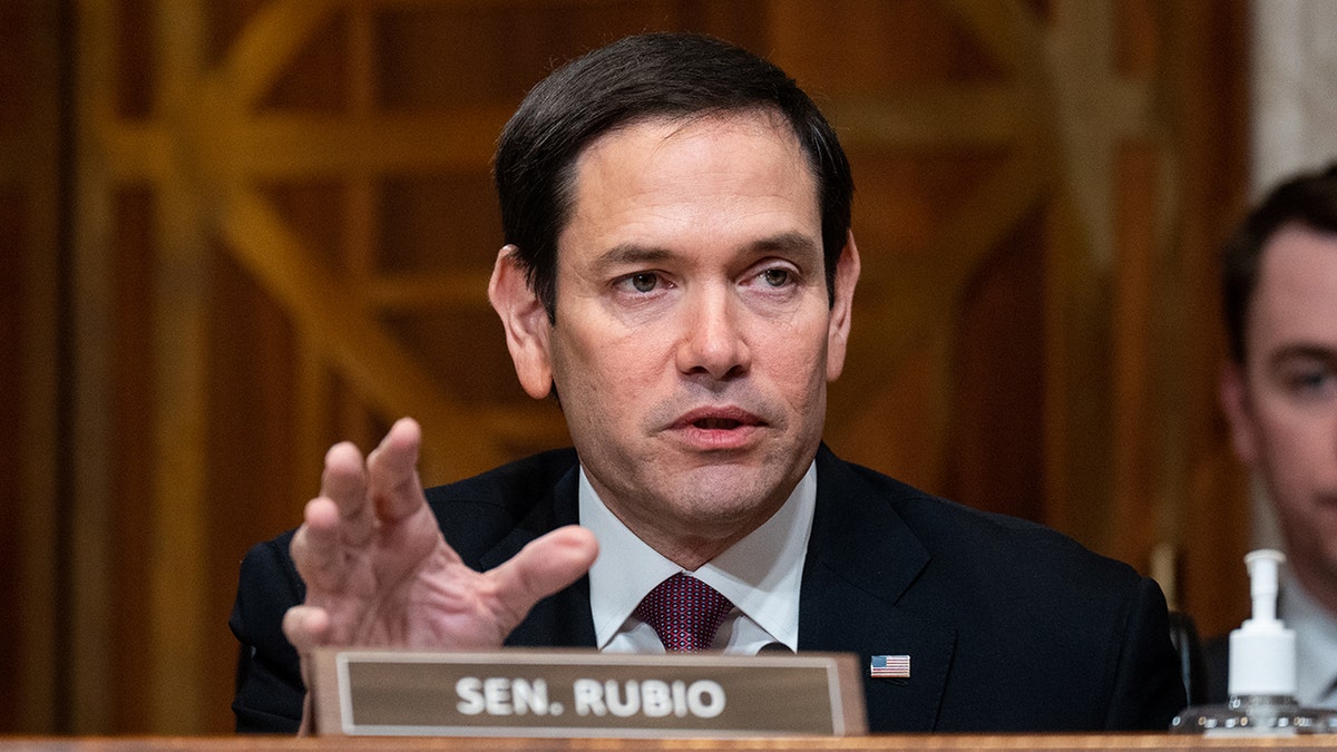 Marco Rubio, R-Fla., astatine  Senate proceeding  talking with manus  raised slightly