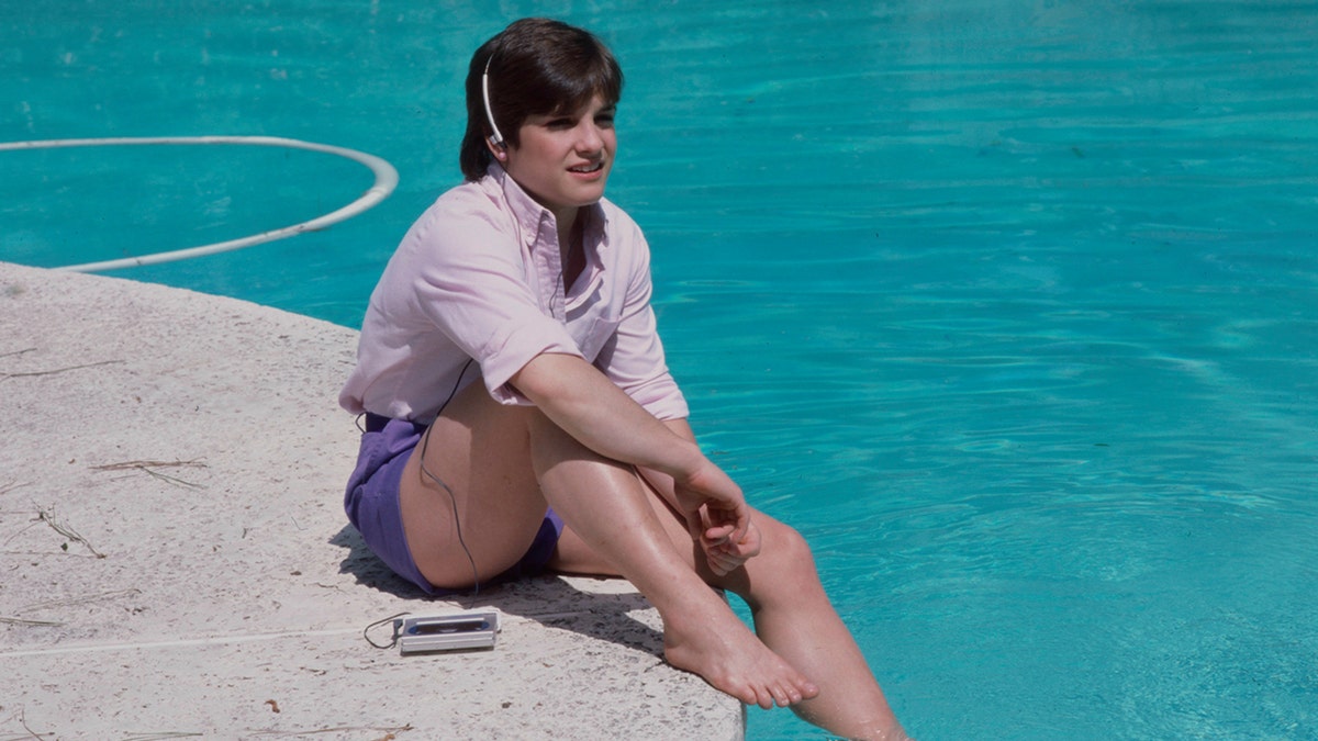 Mary Lou Retton by the pool