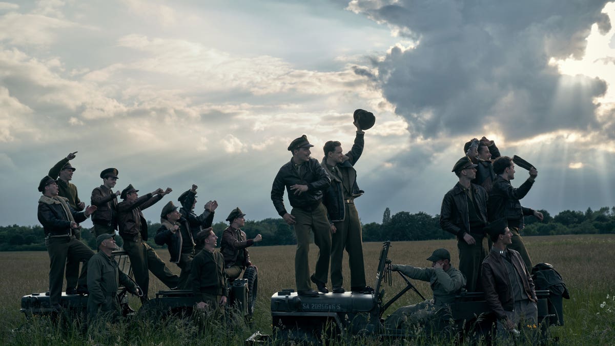 soldiers in a field in masters of the air