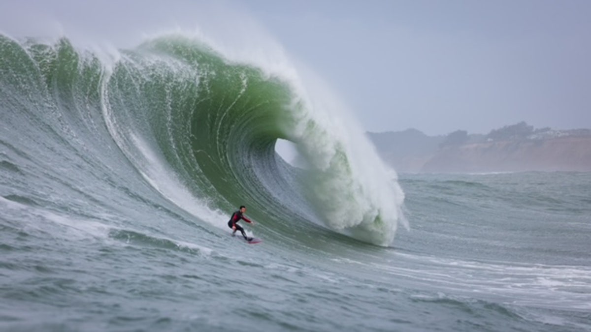 Surfer Luca Padua rides a wave