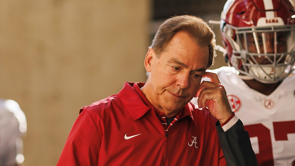 Nick Saban ponders in thought