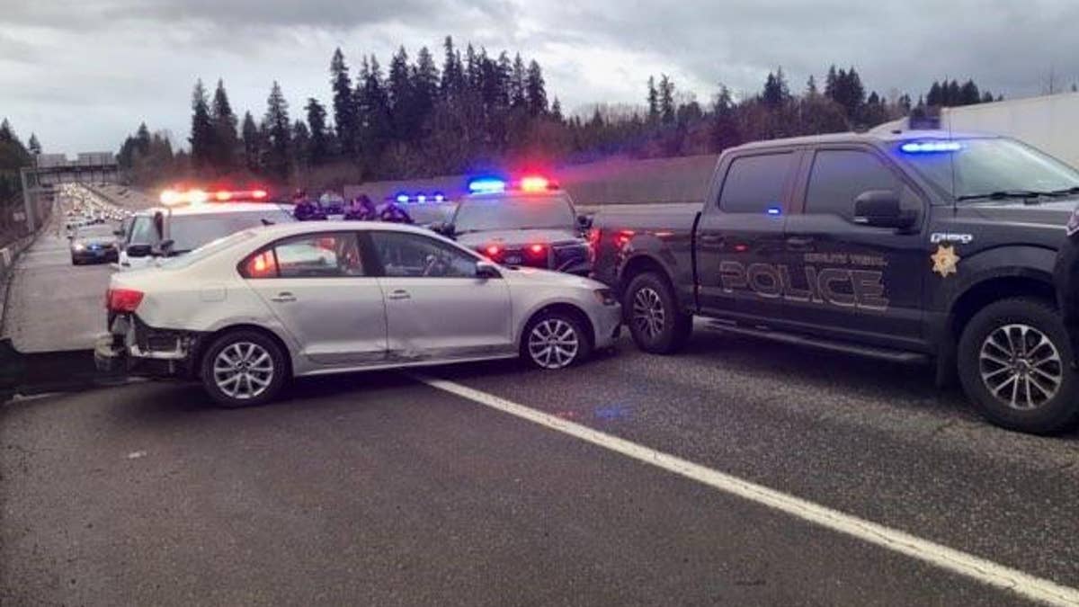 Portland police cars corning a stolen car