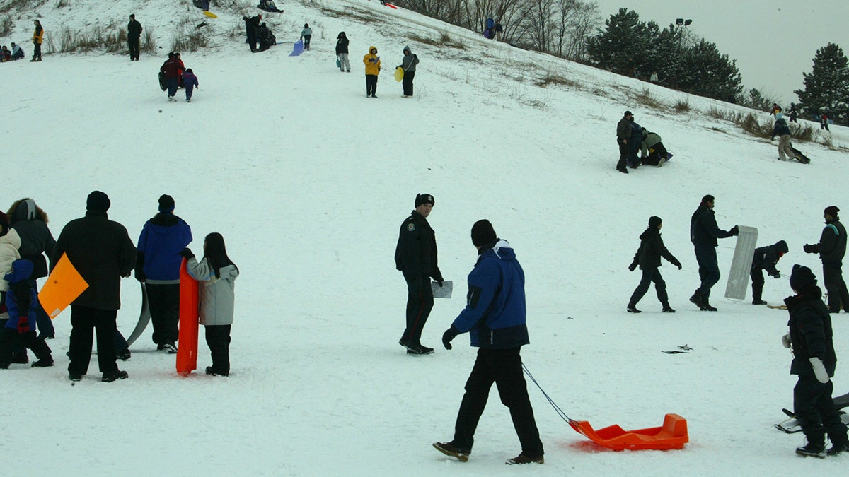 People on snowy hill