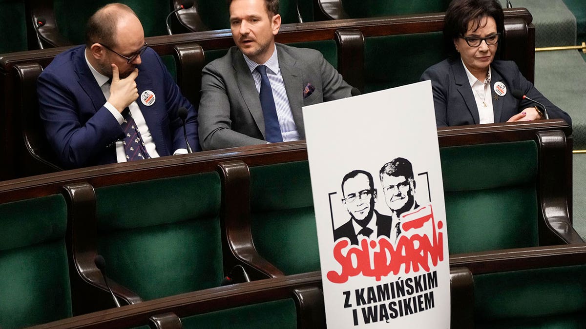 Posters with images of right-wing government