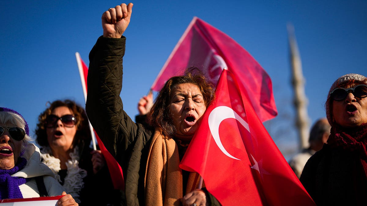 People shout during protest