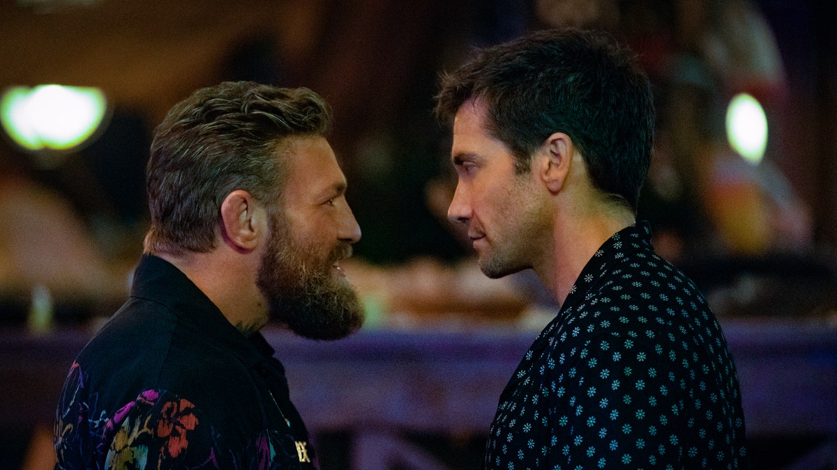 conor mcgregor facing off with jake gyllenhaal in road house