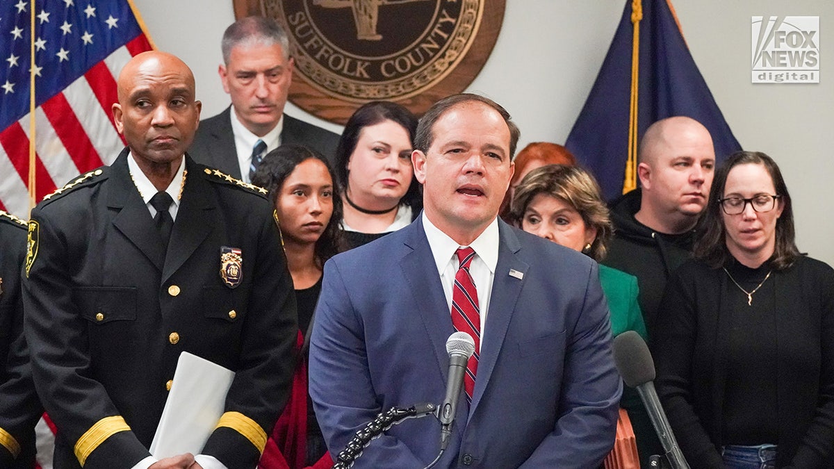 Suffolk County District Attorney Raymond A. Tierney speaks to the media during a press conference at the Suffolk County Courthouse