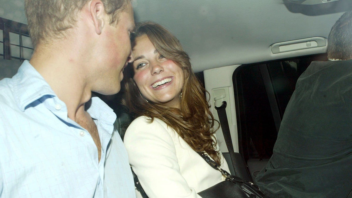 Kate Middleton smiling adoringly at Prince William inside a car