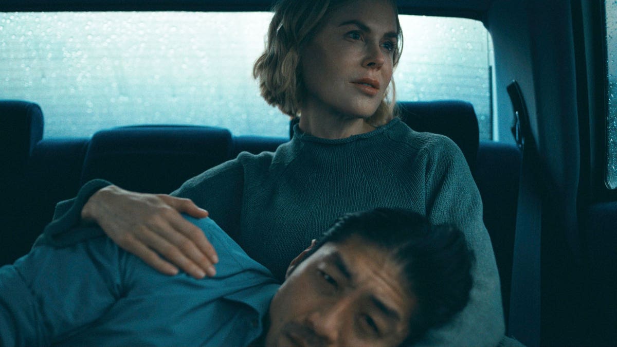 Brian Tee and Nicole Kidman in "The Expats"