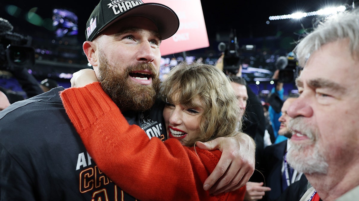 Travis Kelce and Taylor Swift celebrate the Kansas City Chiefs win