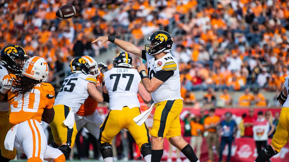 Super Bowl champion Brock Osweiler takes issue with Tennessee trying to score up 35-0 2 Iowa Hawkeyes quarterback throws the ball