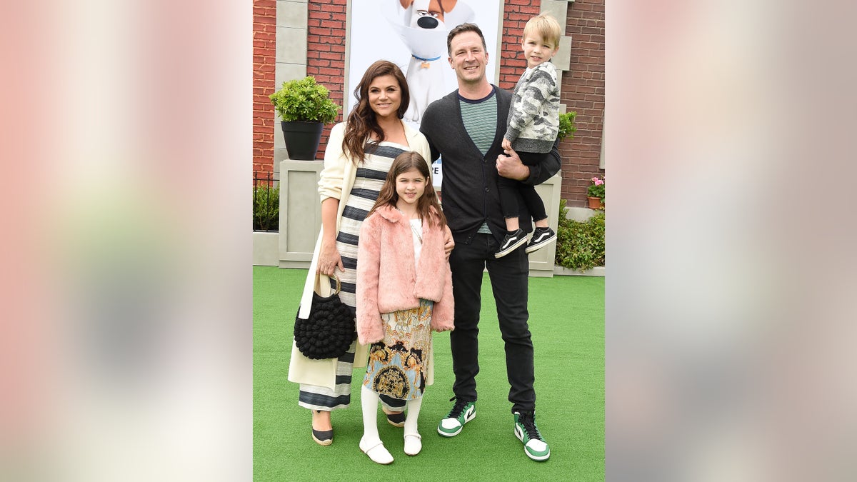Tiffani Thiessen with her husband Brady Smith and children Harper and Holt