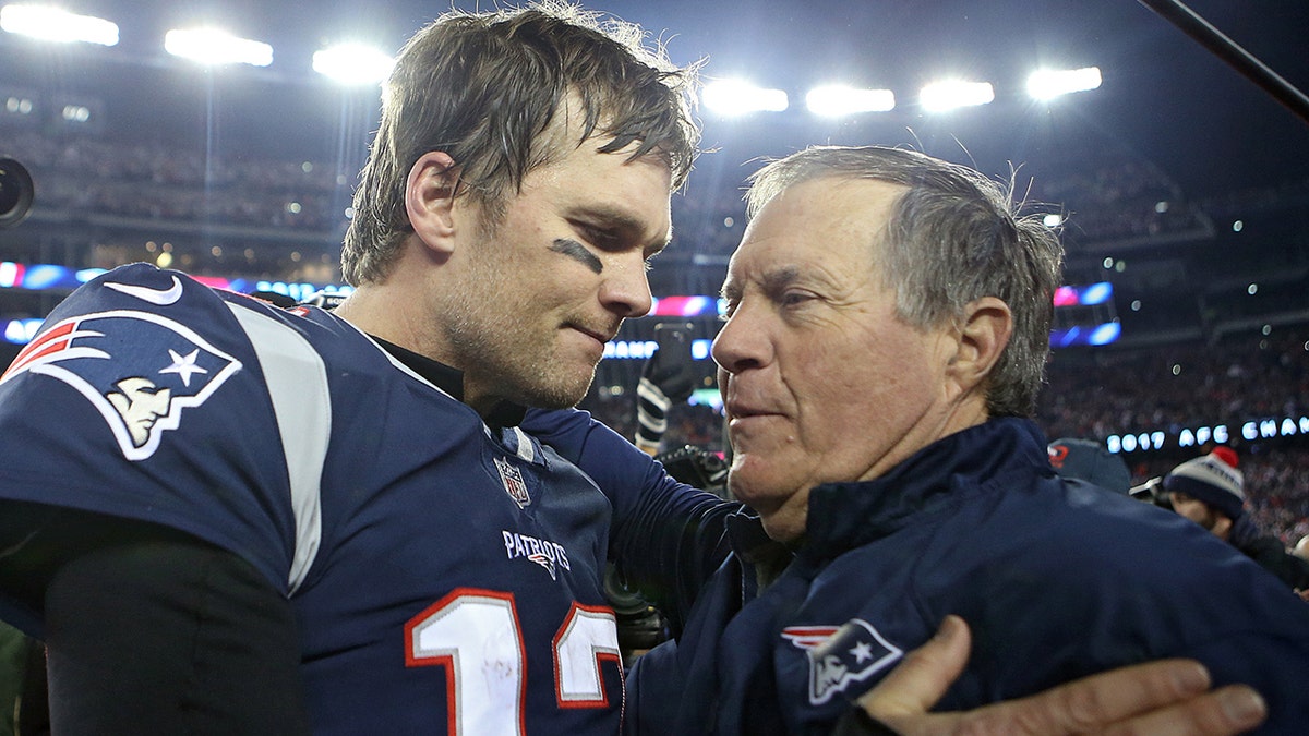 Tom Brady and Belichick embrace