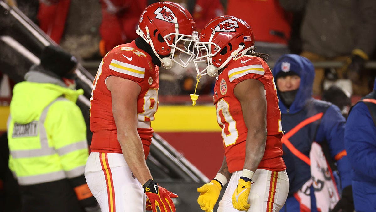 Kelce and Pacheco celebrate