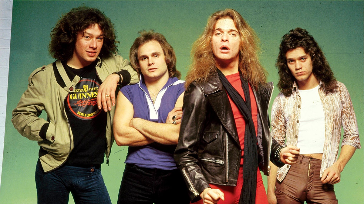 Alex Van Halen, Michael Anthony, David Lee Roth, Eddie Van Halen posing together