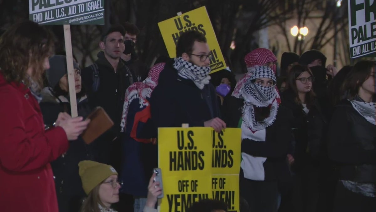 Demonstrators protest U.S. bombing of Yemen outside the White House
