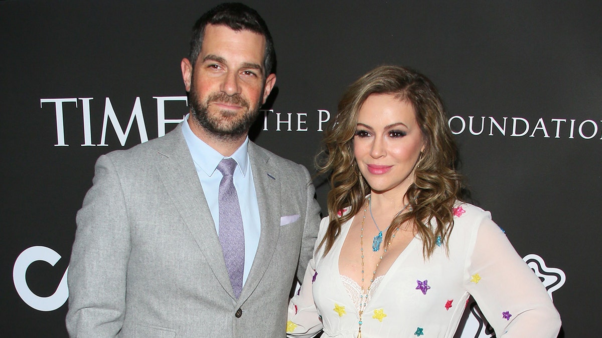Alyssa Milano and her husband on the red carpet