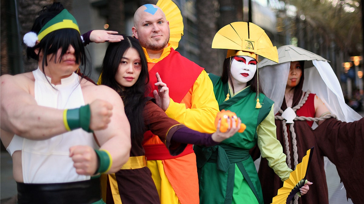 Fans cosplay as characters from Avatar