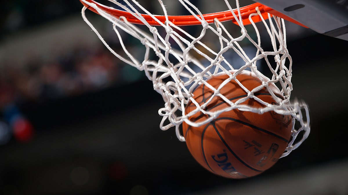 Basketball goes through hoop