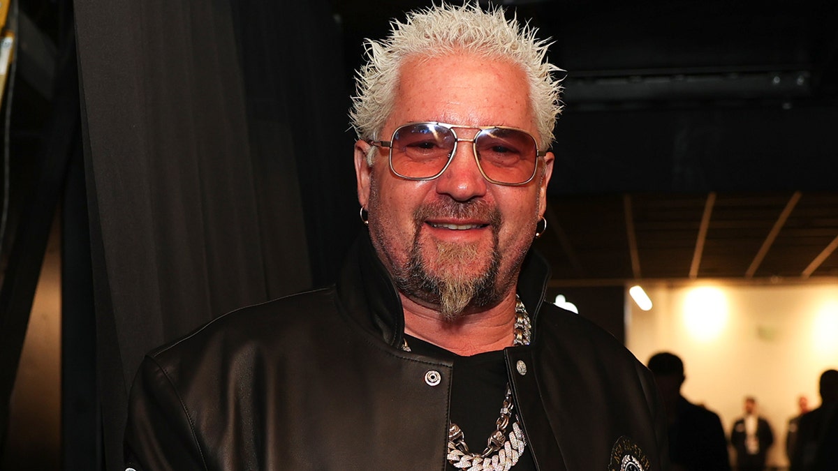 Guy Fieri smiling for the camera