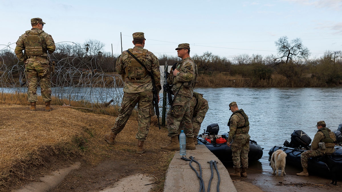 Texas National Guardsman on banks of Rio Grande
