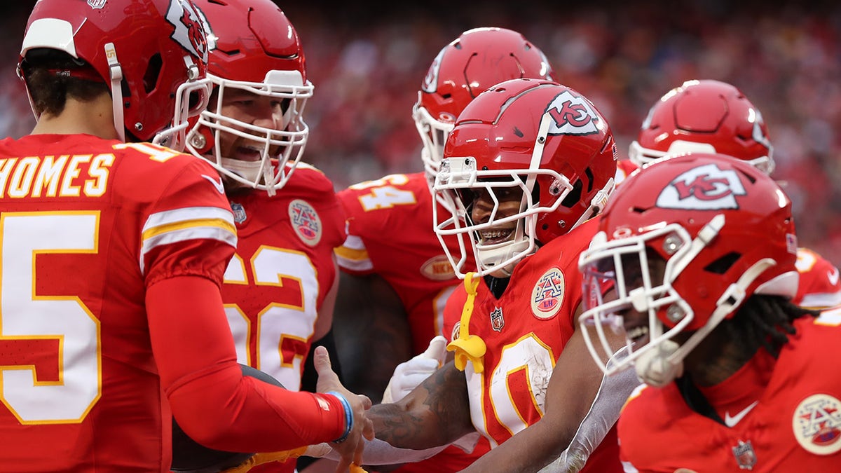 Chiefs players celebrate a touchdown