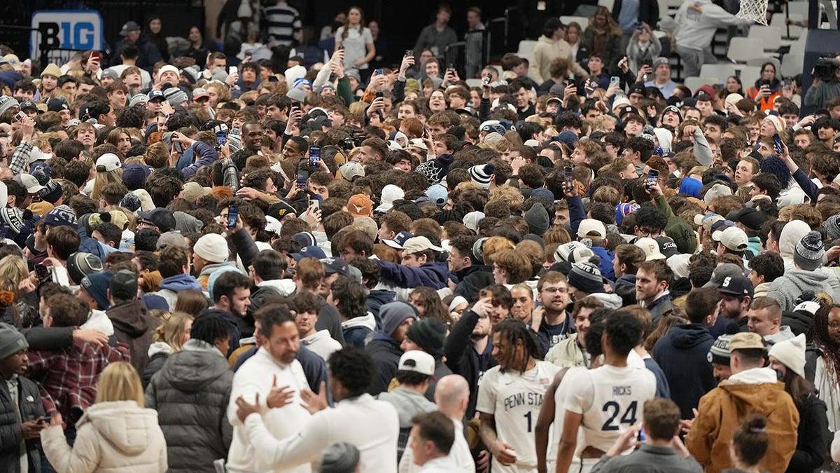Penn State fans storm court