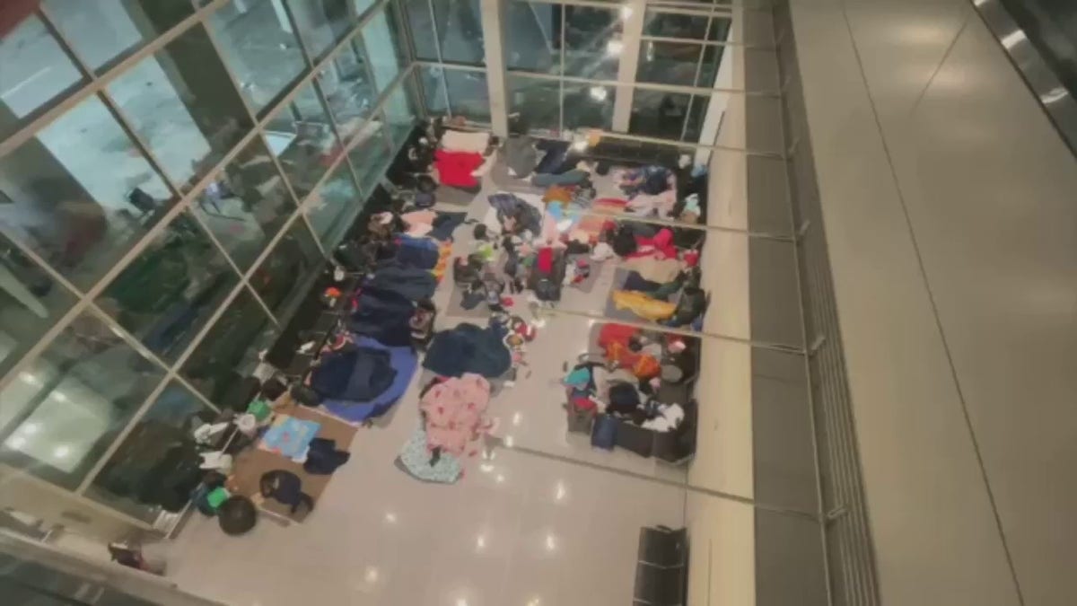 migrants astatine  Logan Airport