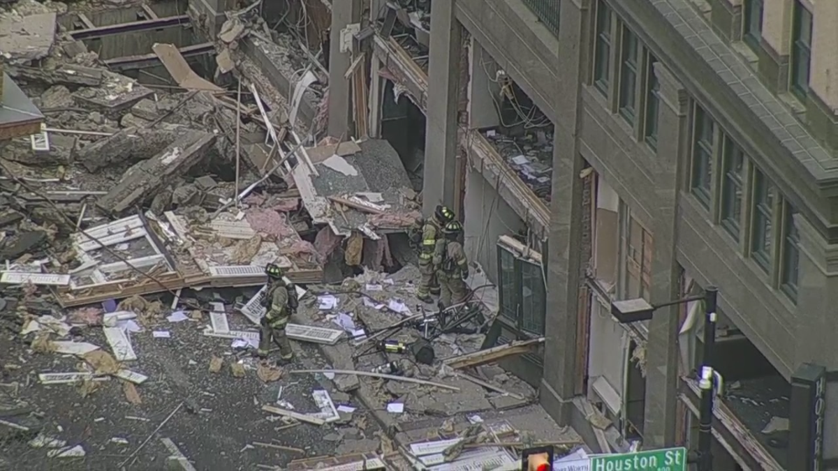 Debris is seen scattered on the street as police investigate a "major incident" at a Fort Worth hotel.