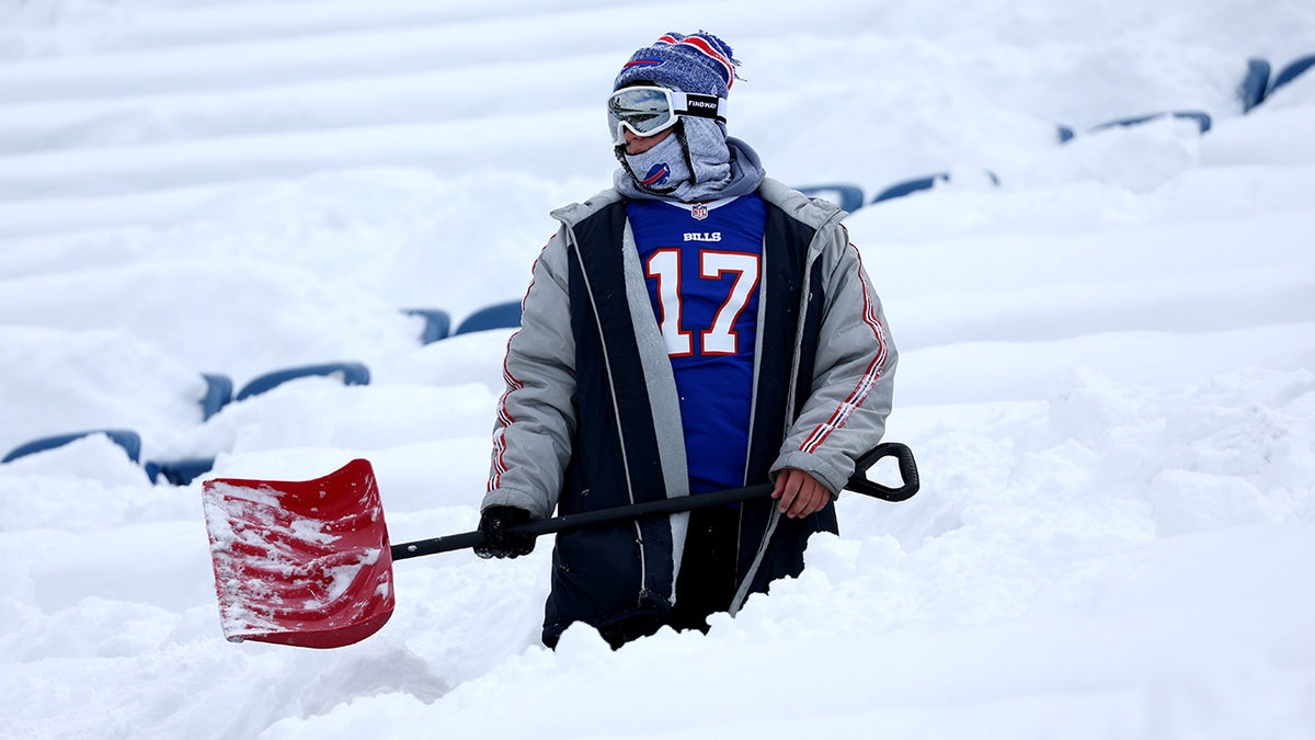 Guy shovels at Highmark Stadium