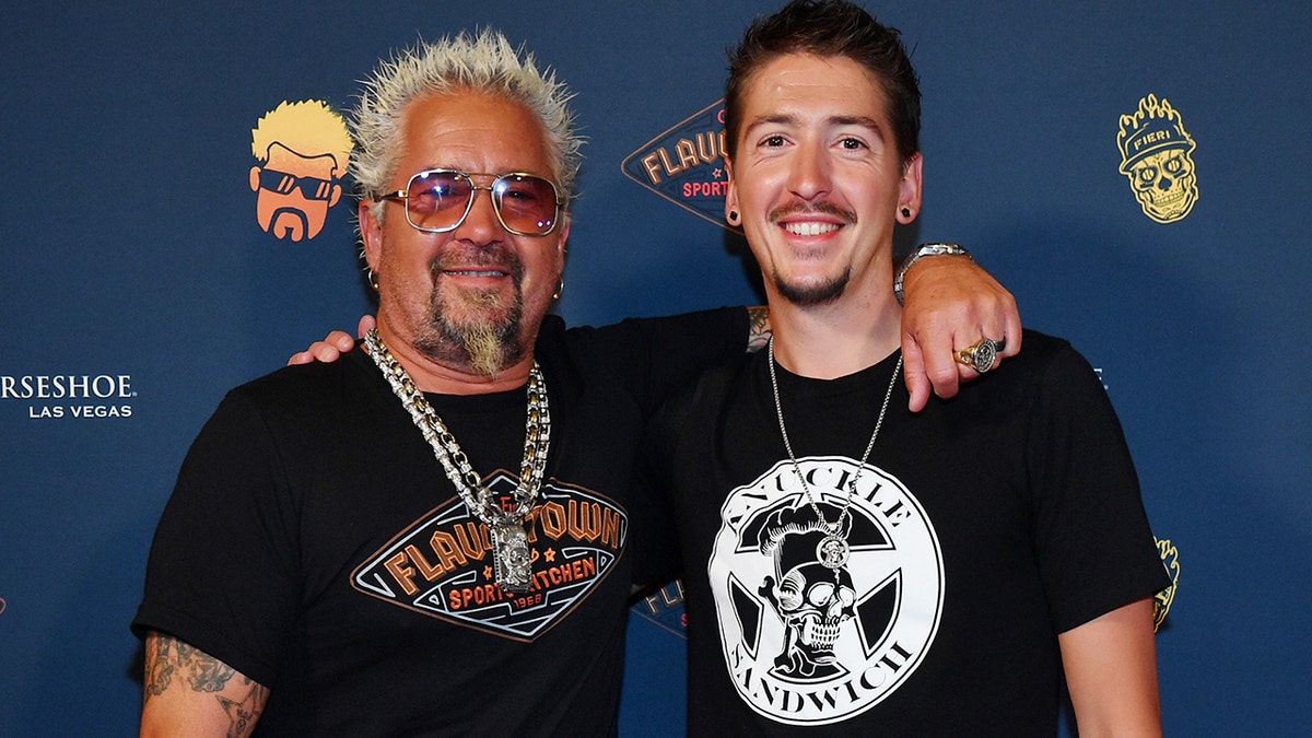 Guy Fieri and his son Hunter hiugging