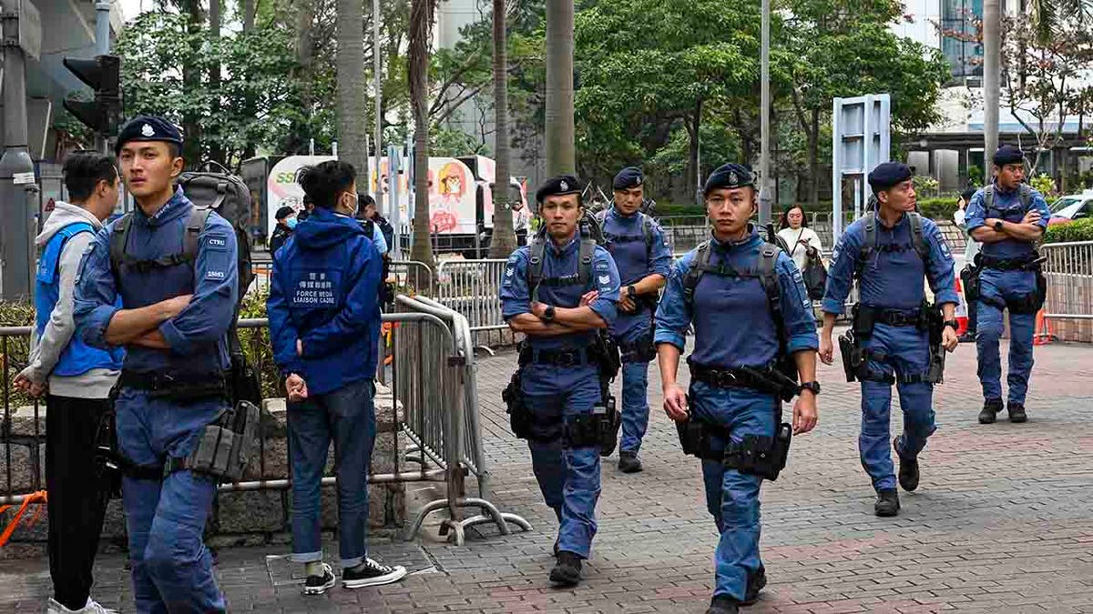 police patrolling in Hong Kong