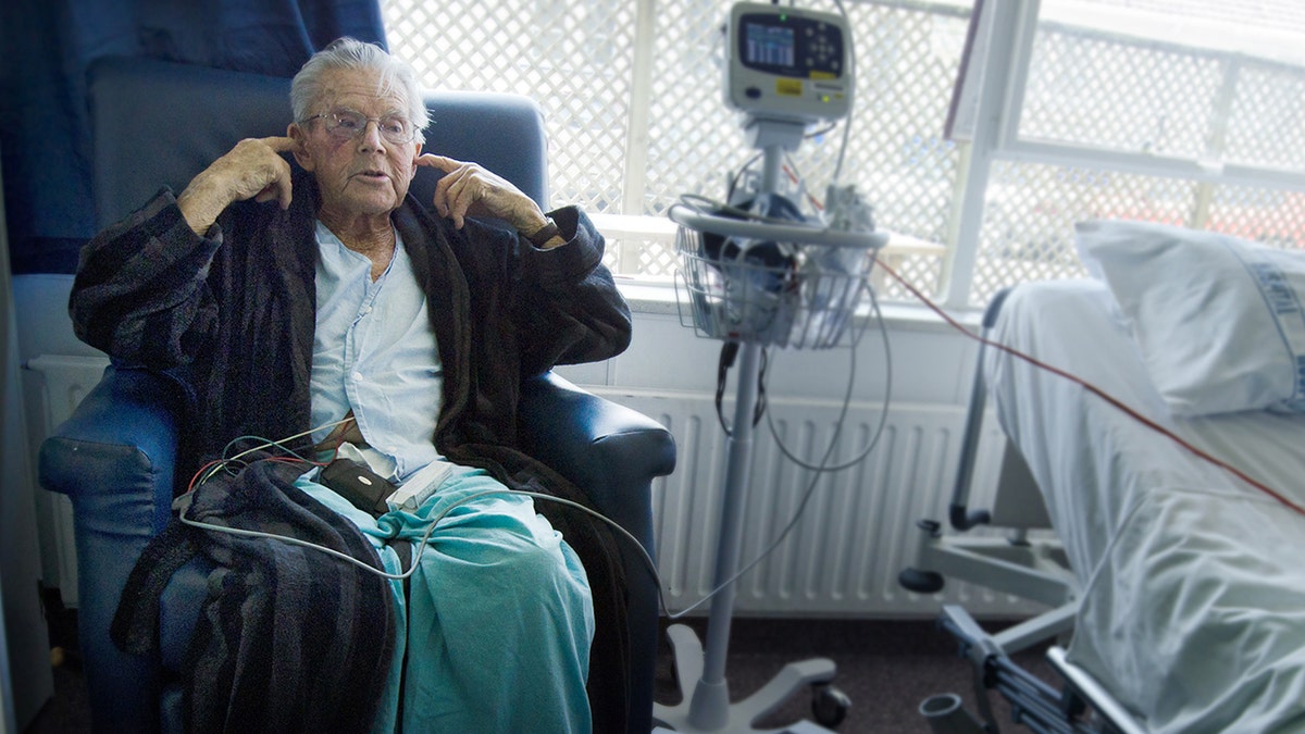 elderly man recovers in hospital