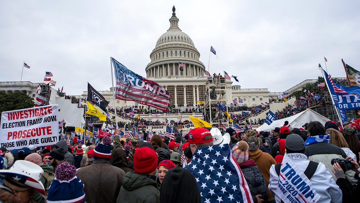 Donald Trump Pro-Trump rioters swarm the U.S. Capitol building on Jan. 6, 2021