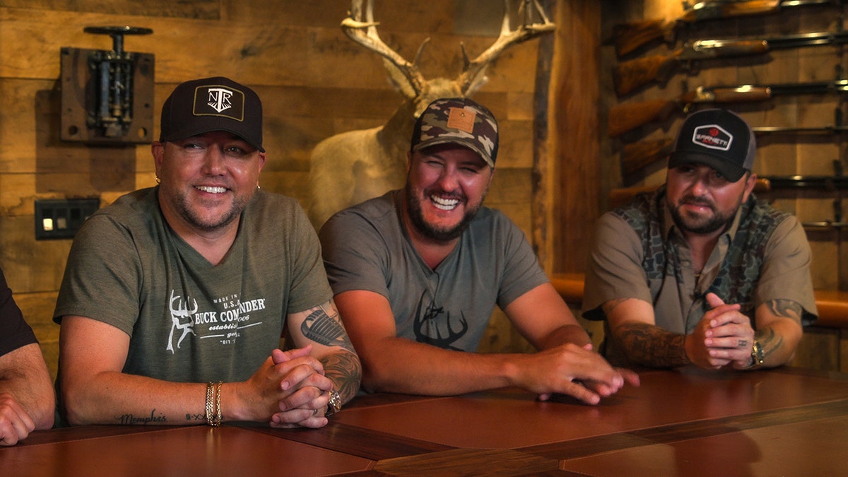 Jason Aldean shares a laugh with Luke Bryan