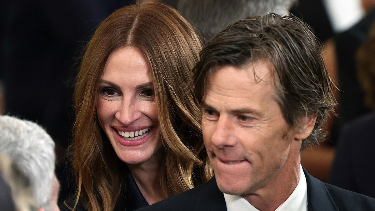 Julia Roberts and husband Danny Moder engage in conversation with Dr. Anthony Fauci