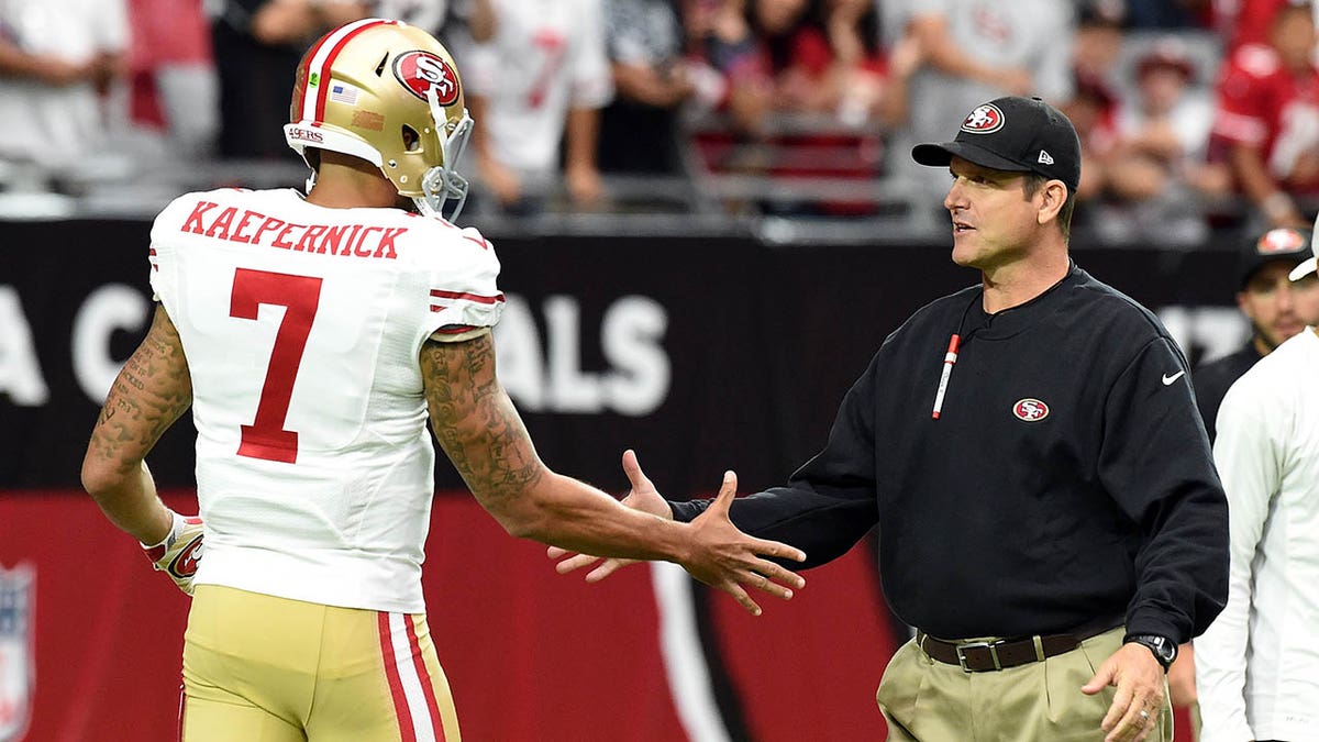 Jim Harbaugh e Colin Kaepernick com os 49ers