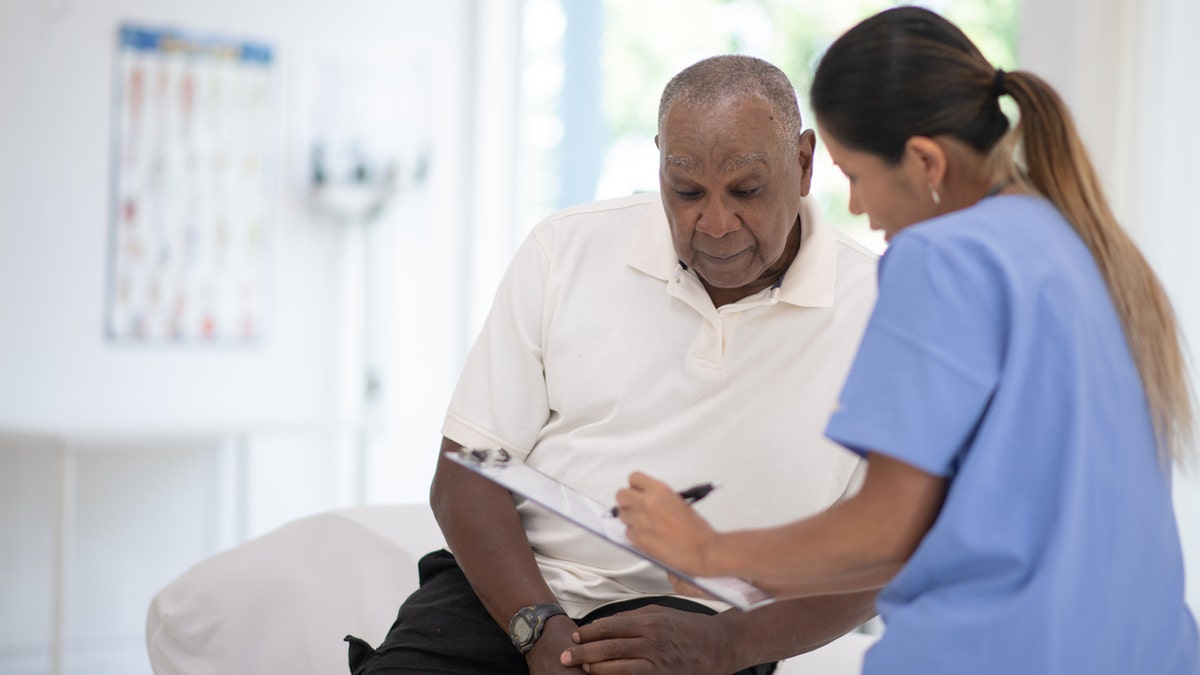 Man at doctor