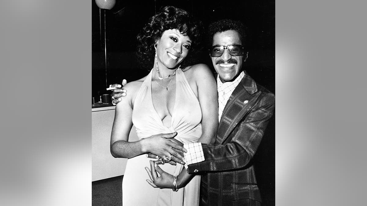 Marlena Shaw smiles in a black and white photo with Sammy Davis Jr.