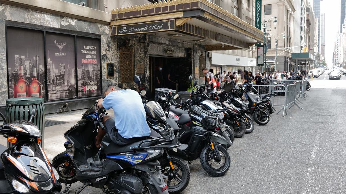 A line of mopeds outside the Roosevelt Hotel in New York City