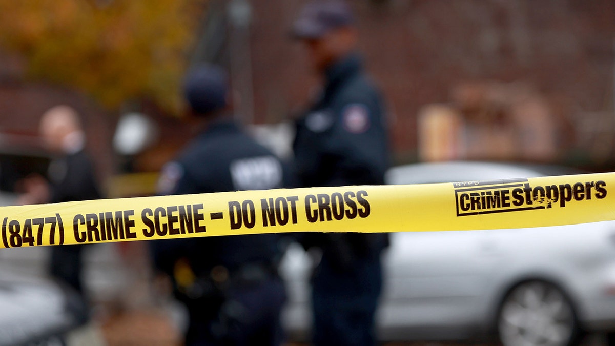 NYPD officers at crime scene